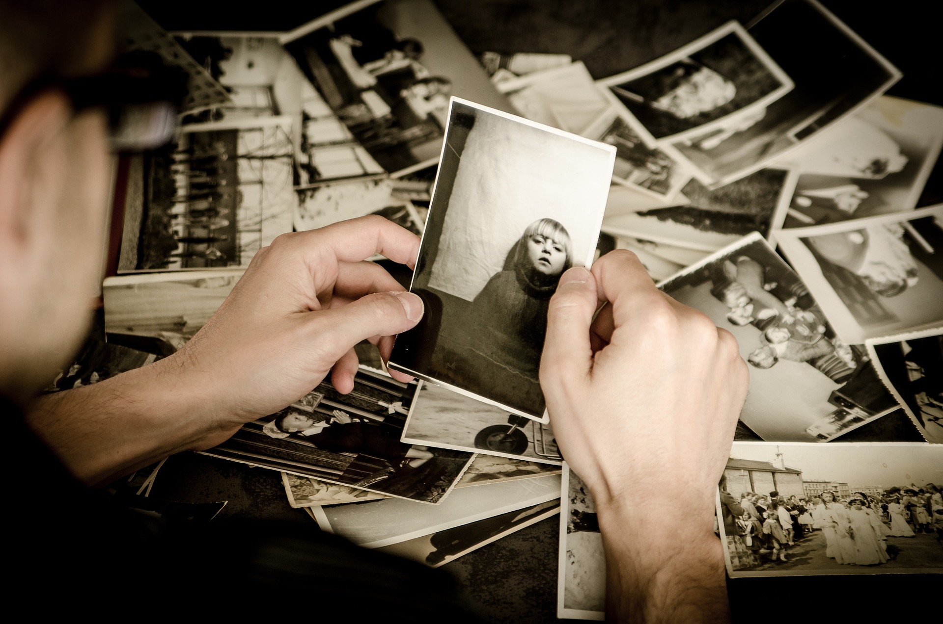 photographs-01 Insividual looking at old photographs